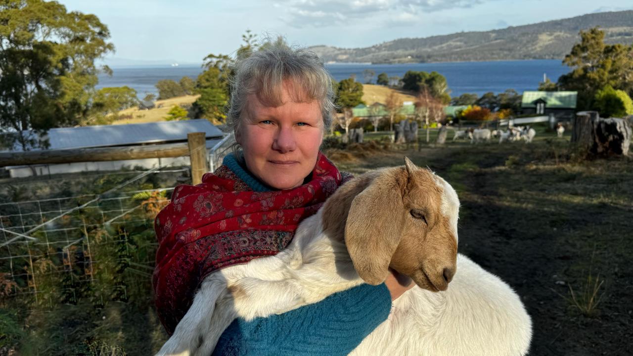 Christine Bishop with a baby goat