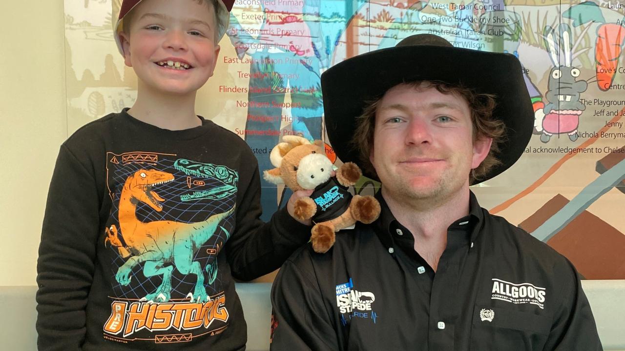Jacob Hall with bull rider Josh Clark