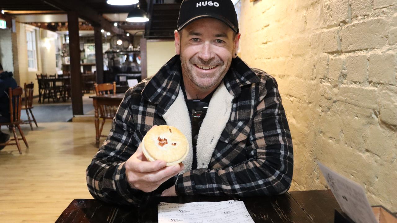  JJ’s owner Nathan Johnson with a maple bacon and brisket pie.