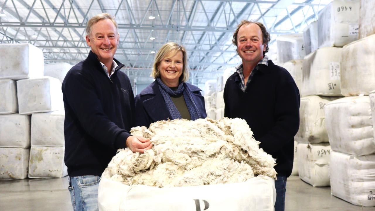 Alisatair Calvert of Wool Solutions with Nina and Will Bennett of Ashby, Ross, which has produced a superfine bale of wool that fetched $330 per kilo at auction. Alisatair Calvert of Wool Solutions with Nina and Will Bennett of Ashby, Ross, which has produced a superfine bale of wool that fetched $330 per kilo at auction.