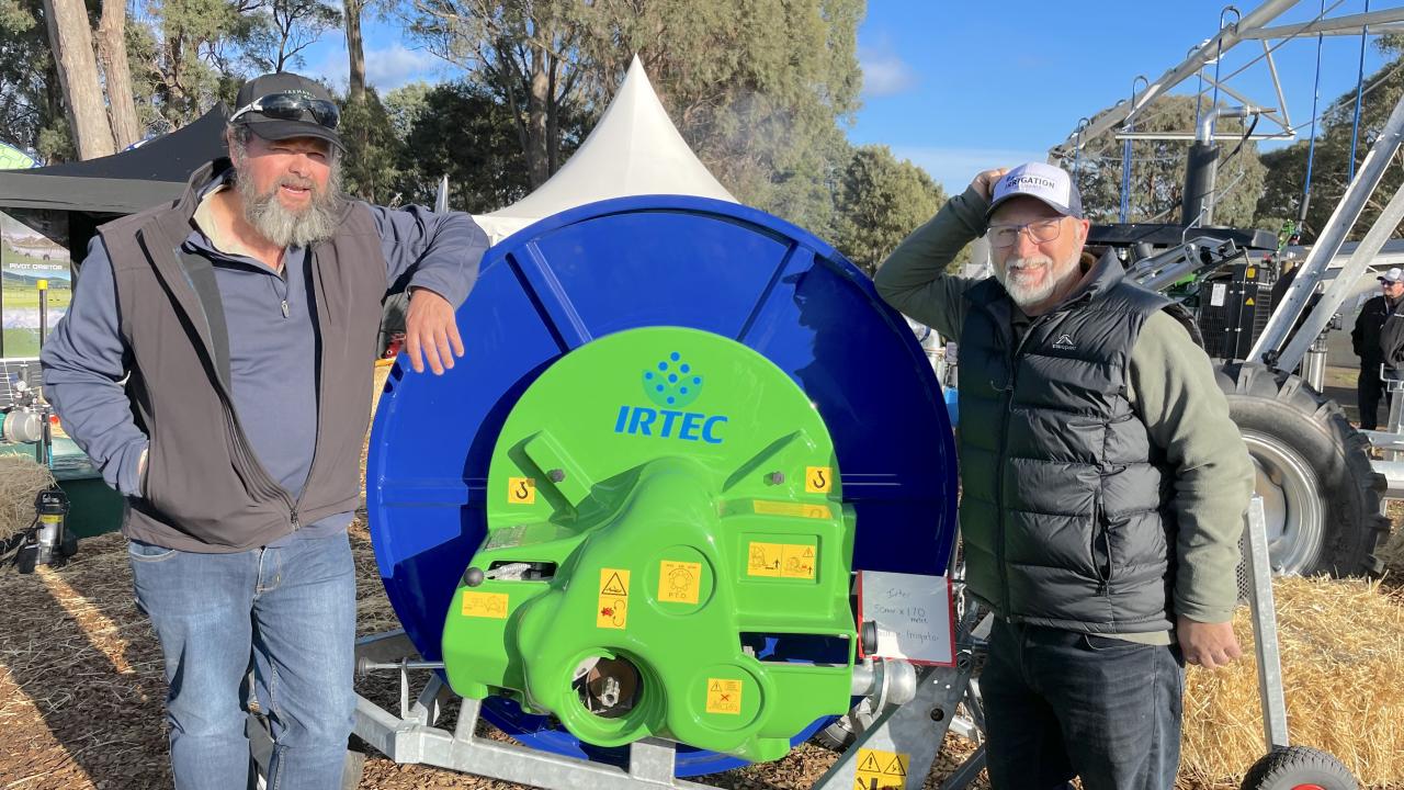 Justin Burbury from York Plains talks to Colin Targett of Van Diemen’s Land irrigation about the hard hose irrigator with Van Diemens Land Irrigation consultant Colin Targett.