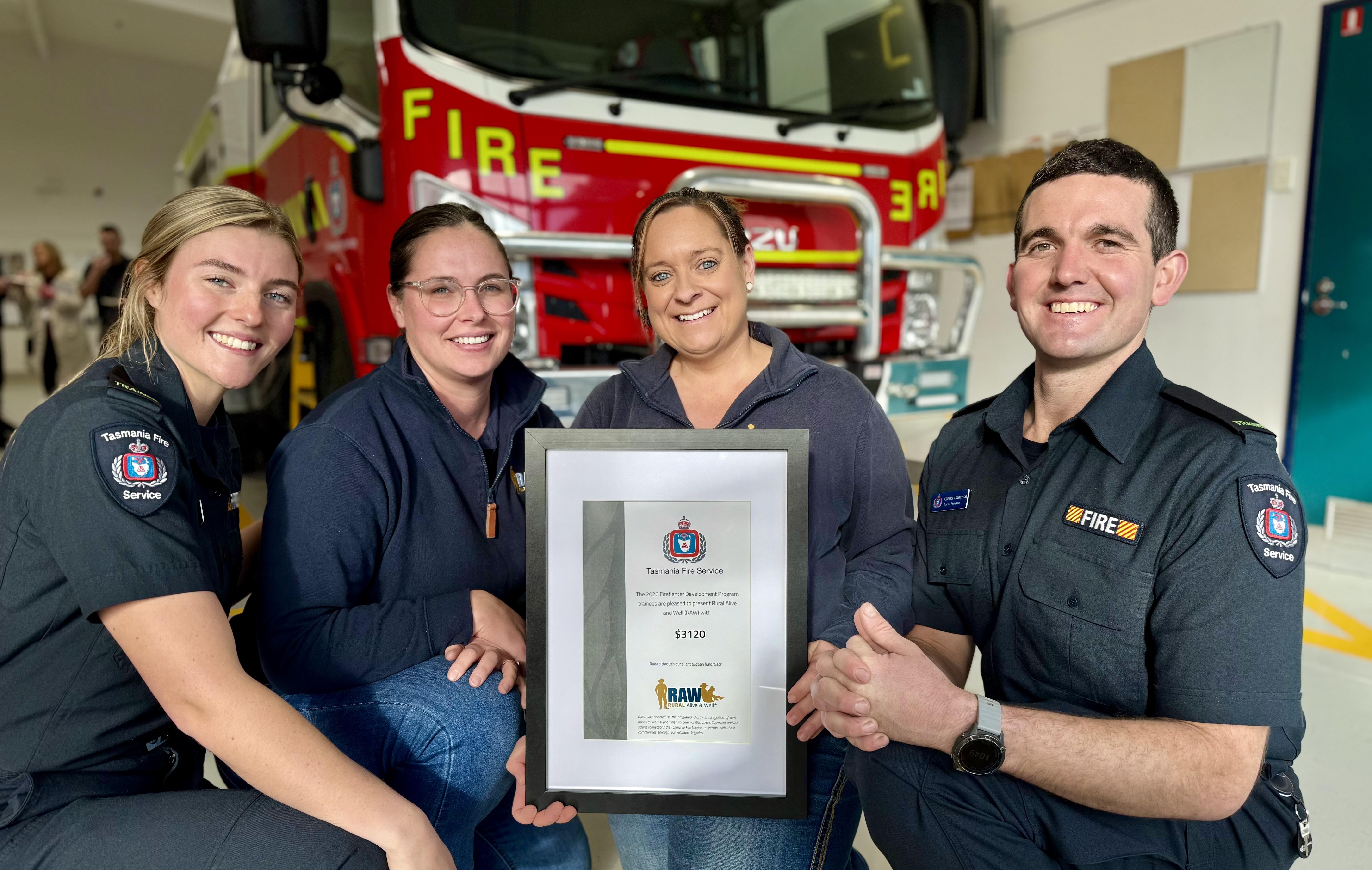 Tasmania Fire Service firefighters Grace Siggers and Connor Thompson meet with Ashley Cusick (Community Engagement South) and Julia Batchelor (Outreach Team Leader), of Rural Alive and Well.