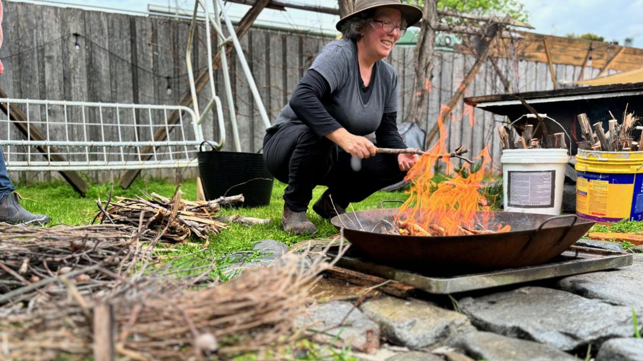 Christina Guidici runs workshops where she teaches people simple, low tech ways to make their own biochar. Ms Guidici runs workshops with many groups showing them simple, low tech ways to make their own biochar.