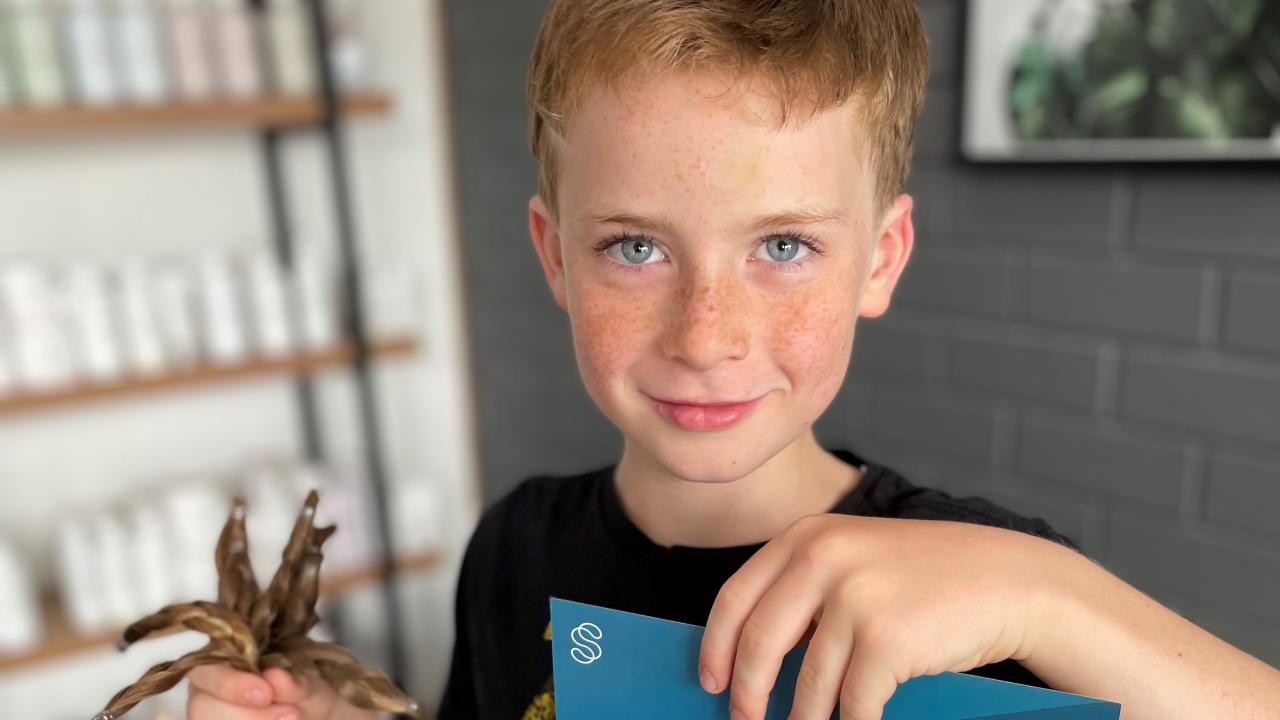 Ryder Johnstone with his chopped locks for charity. Ryder Johnstone