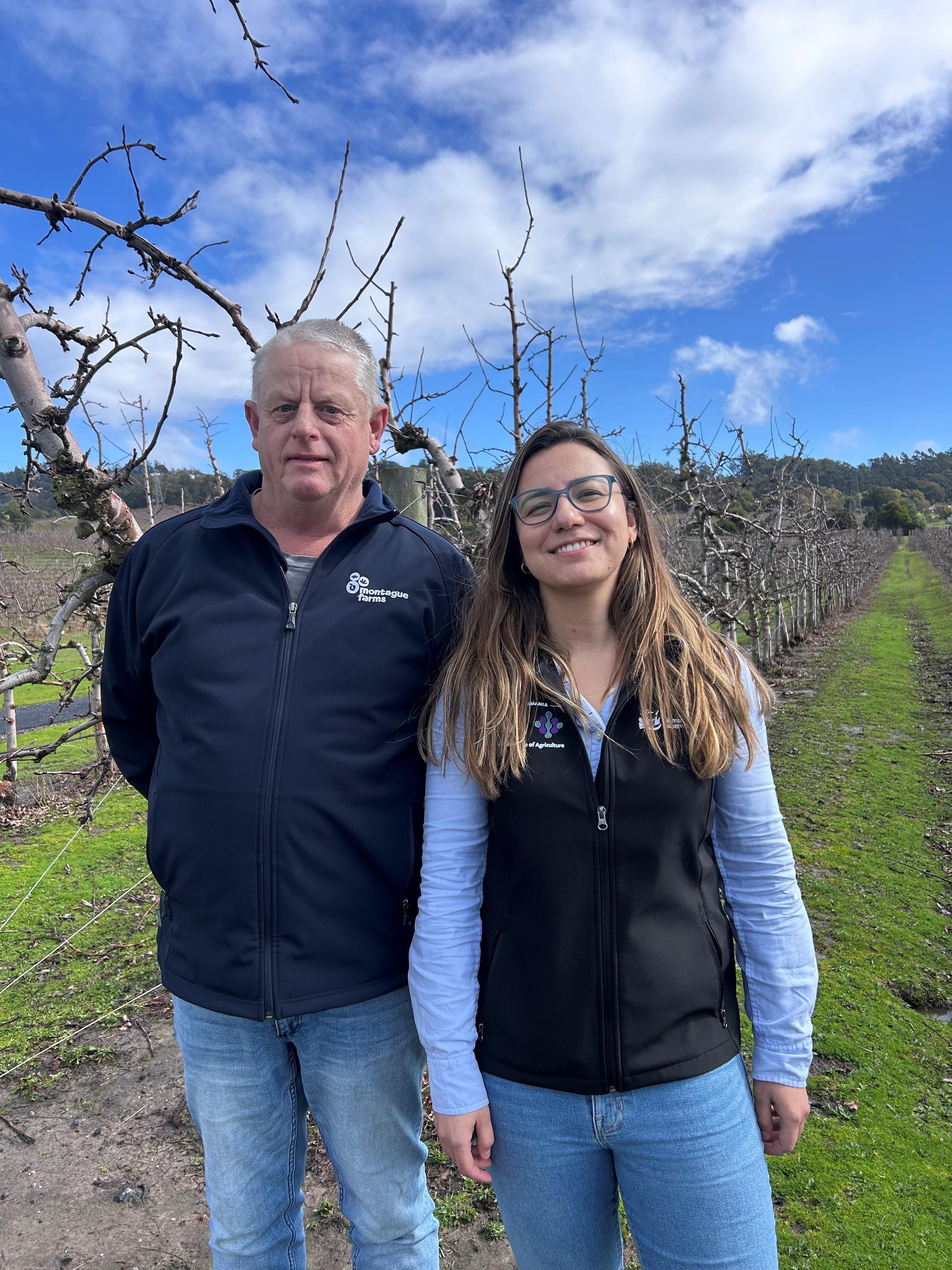 Rodney Hogan of Montague Farms and tree crop physiologist Leticia Reis