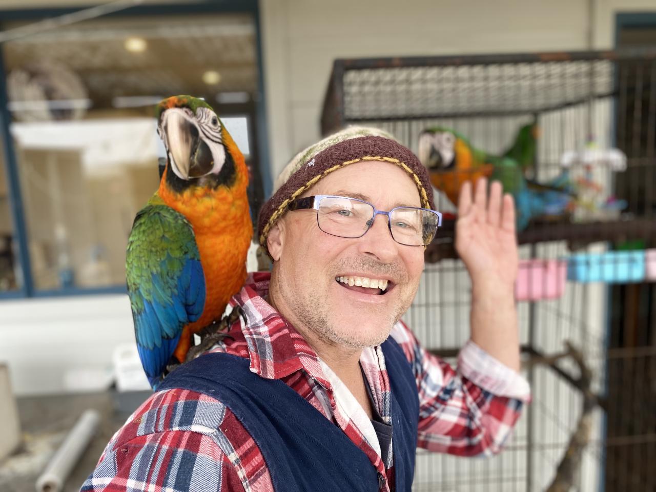 Damon with his macaw