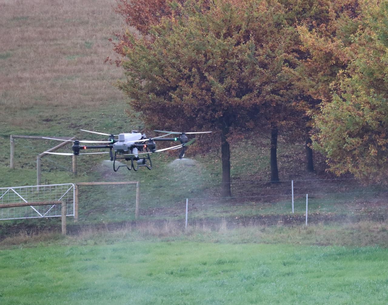 A drone spraying fields