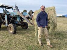 Gaunts Farm enterprise goes right back to basics as Adrian feeds cattle.