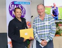 Snackables encouragement award winner Narls Samarasinghe and Harvest Moon managing director Mark Kable.