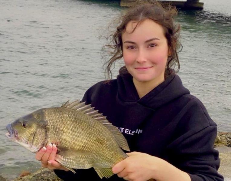 16-year-old Treasure Williams with a big Black Bream she caught on bait from Midway Point recently.