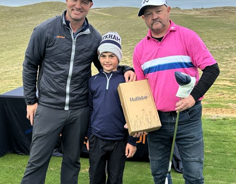 ir Adventures Golf general manager Jon Perrett, left, with young golf sensation Zac Wolfe and overall title  winner Matt Cullen.