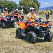 Darcy, Brodie and Gemma concentrate on their ATV driving skills during training at Campbell Town District High School