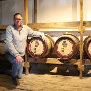 John Ramsay with barrels of Clyde Mill whisky