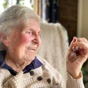  Margaret Elliott, 99, with the Civilian Service Medal she received decades after serving in the Women’s Land Army.