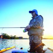 Casting for trout from a boat
