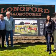 Signage Working Committee member and former racing journalist Peter Staples, Longford racing legend Max Baker, committee member Dennis Pettyfor, Racing Minister Jane Howlett, committee members Neil Tubb and Barb Baker with the new Longford Racecourse signage.