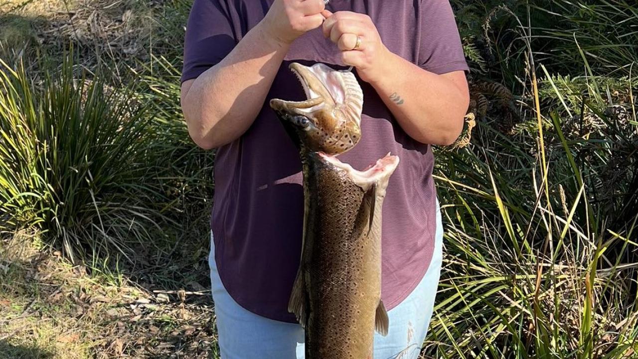 Kylie Price with the 2.9 kg or 6.6 lb brown trout she caught from the Huon River. Kylie Price with the 2.9 kg or 6.6 lb brown trout she caught from the Huon River.