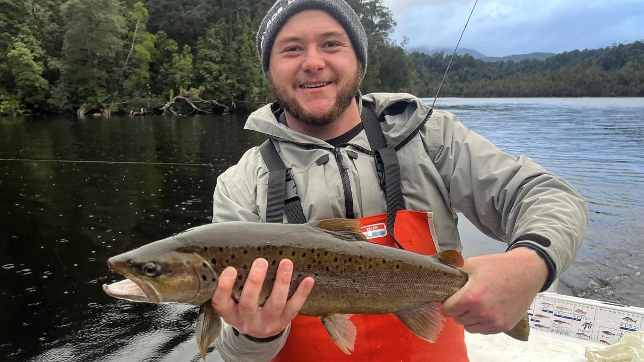 Mark Botha with a healthy brown trout caught from the Gordon River on the West Coast of Tasmania recently Mark Botha with a healthy brown trout caught from the Gordon River on the West Coast of Tasmania recently