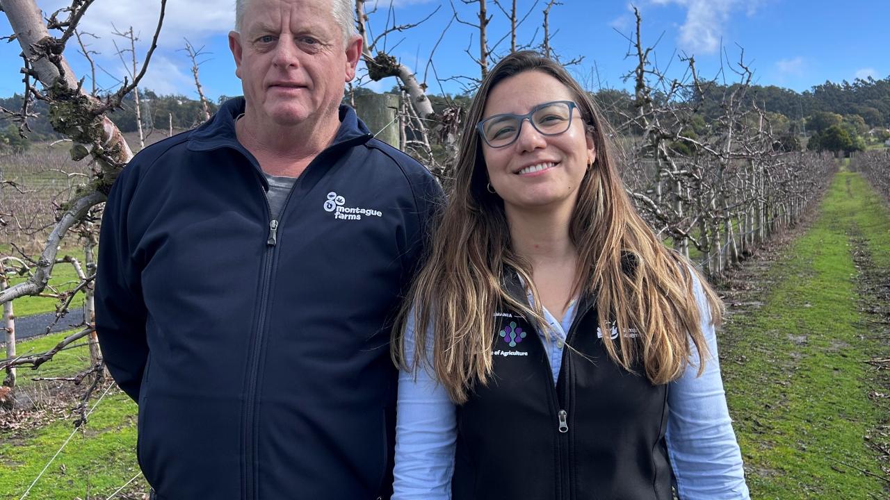 Rodney Hogan of Montague Farms and tree crop physiologist Leticia Reis