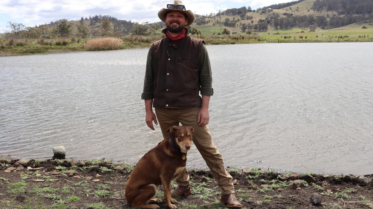 Logie Farm manager Lachlan Van Balen with Baxter