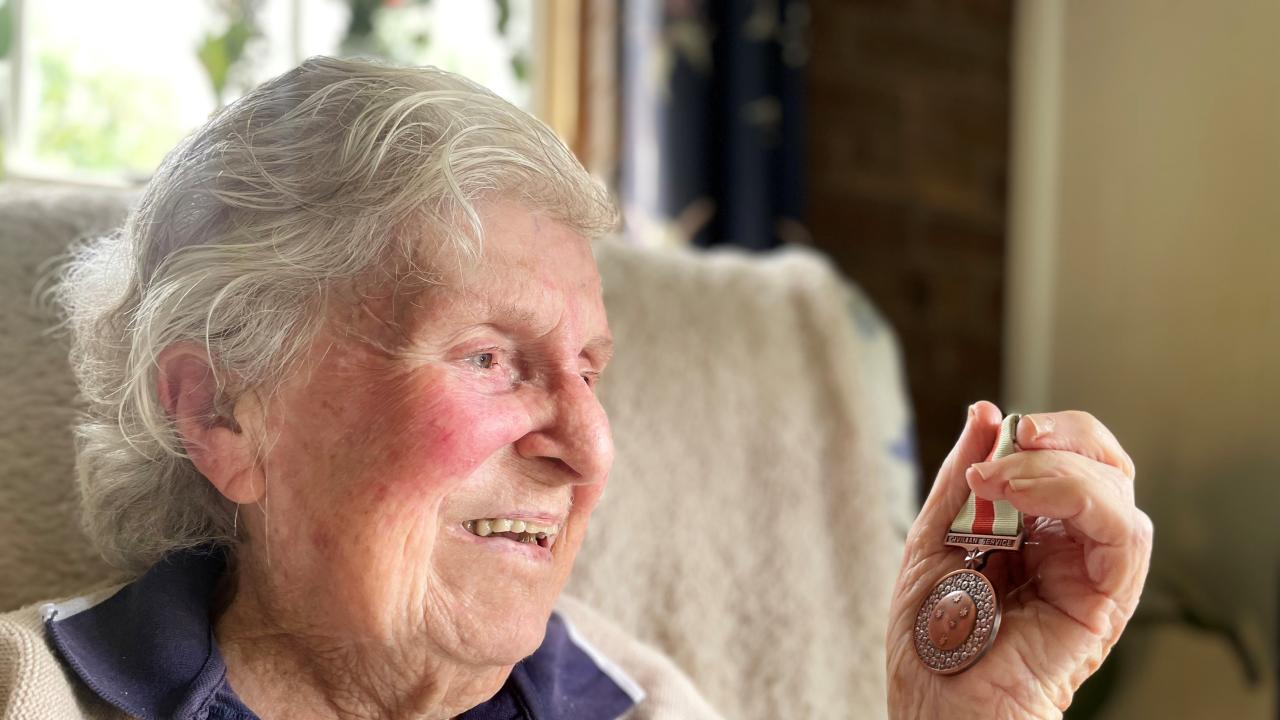 Margaret Elliott, 99, with the Civilian Service Medal she received decades after serving in the Women’s Land Army.