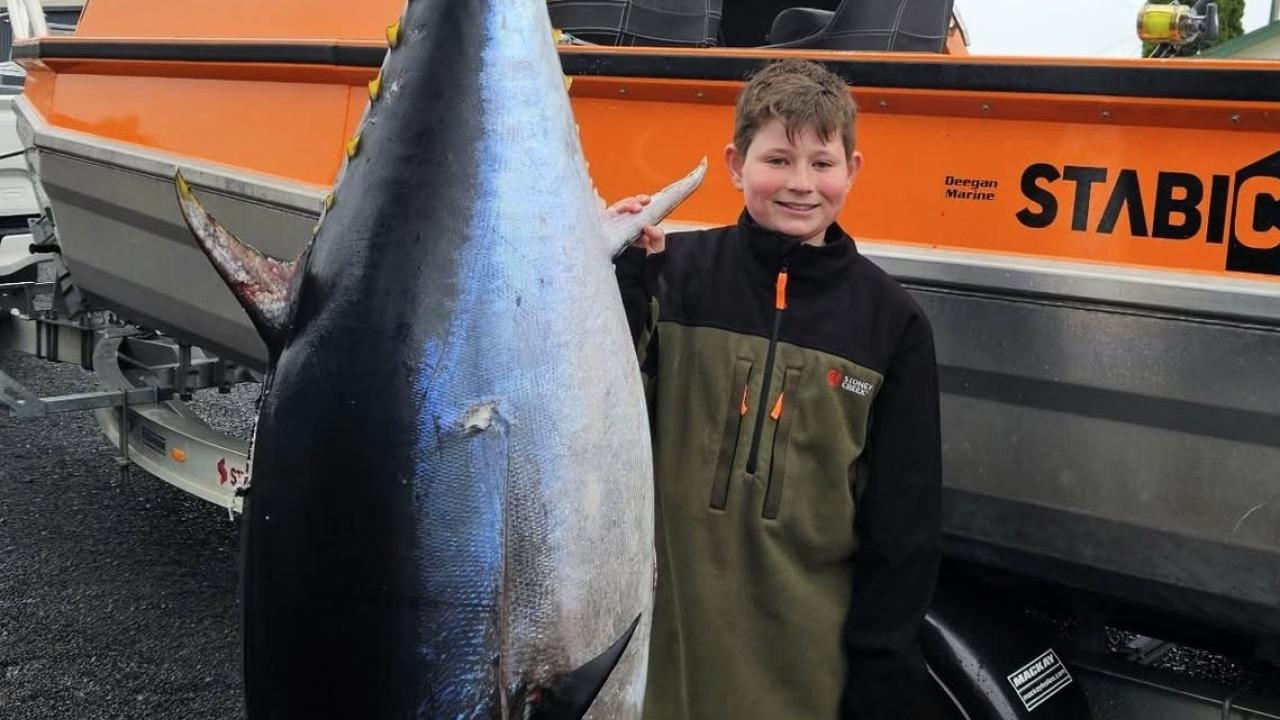 Harrison Nicole, 12, with the 130.5 kg Southern Bluefin Tuna he caught off Bass Strait.