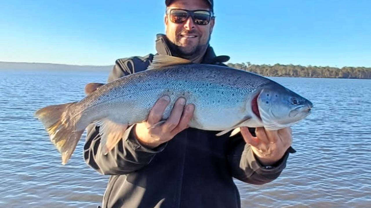 Clinton Cantwell with a solid female brown trout he caught from Lake Crescent last week