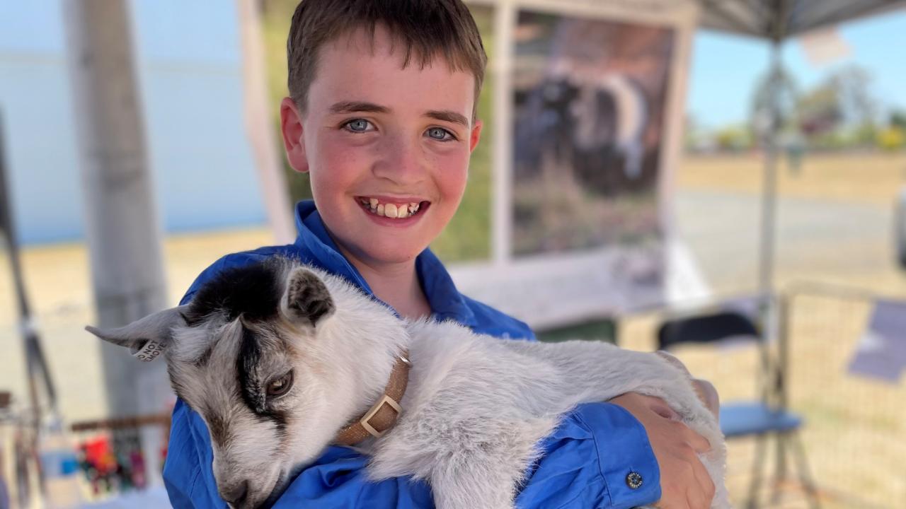 Baxter Rowbottom with Gracie the pygmy goat