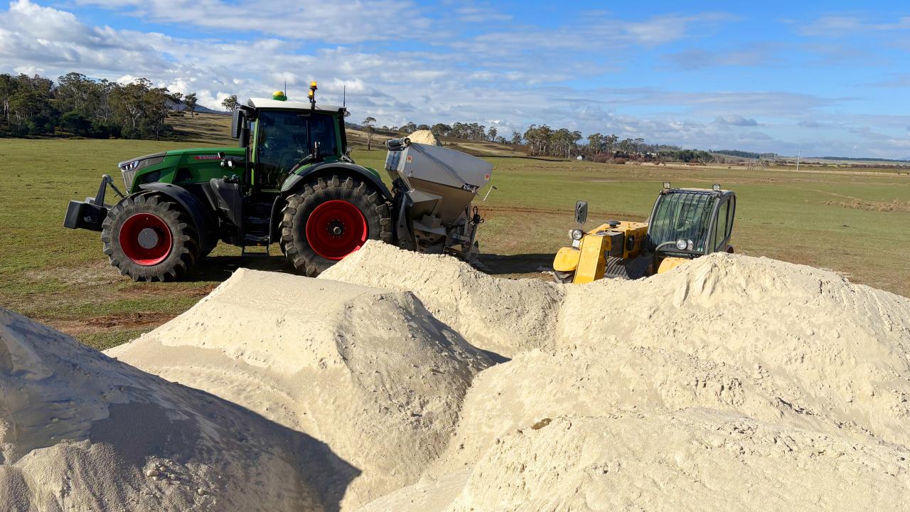 Roger River Dolomite being loaded for application to support soil health and pasture productivity.