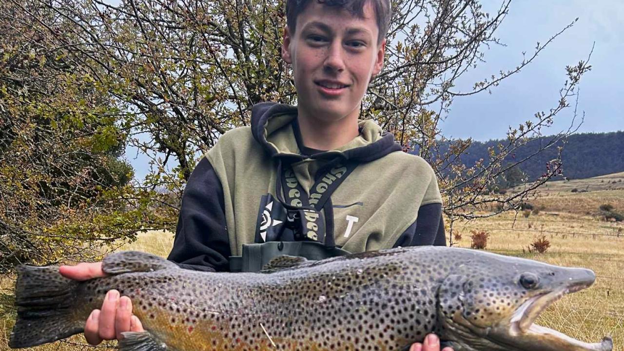 Conna George with the big 5kg buck male brown trout he caught and released last weekend.