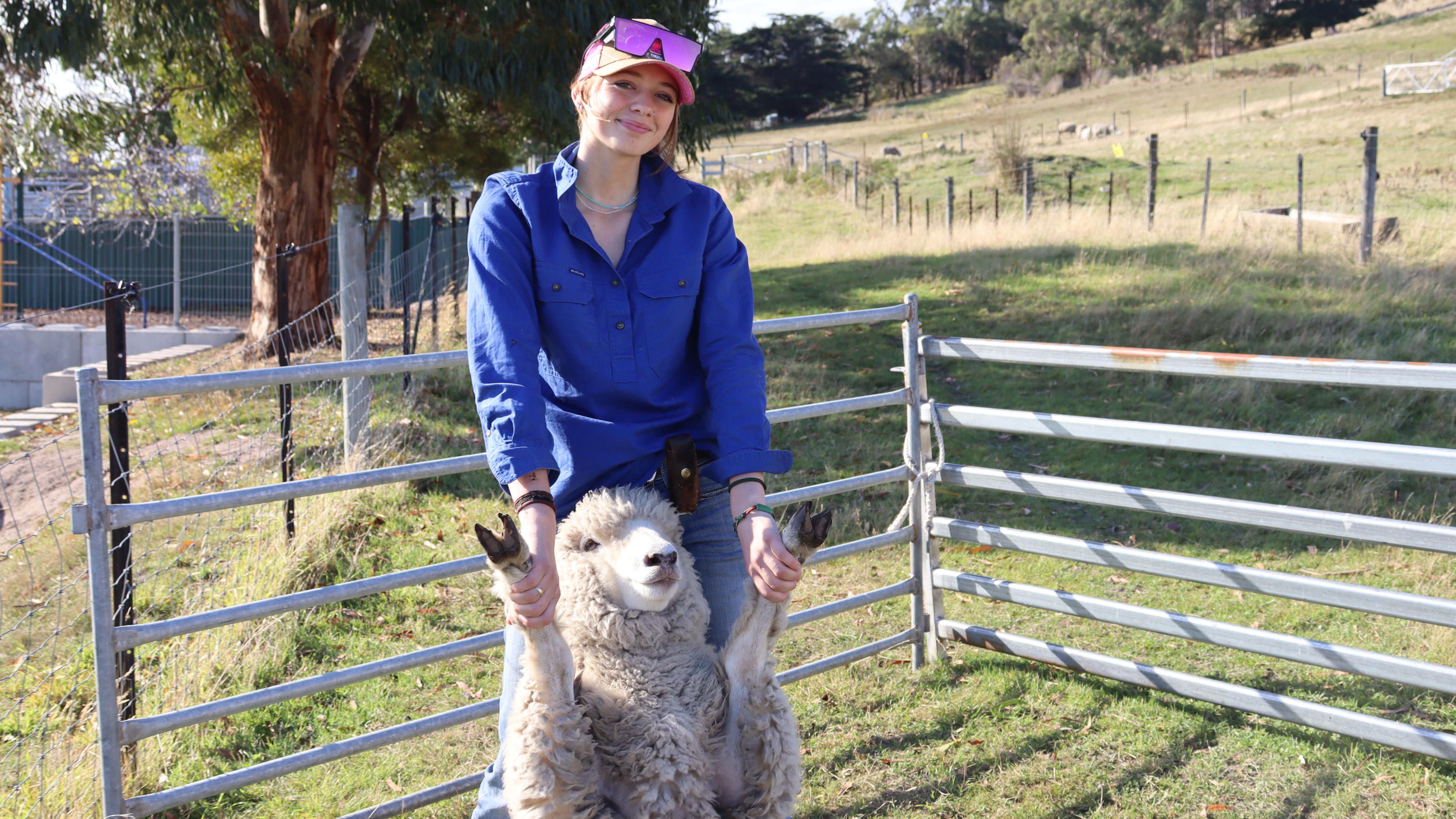Tasman District School student Jameika Thomason with a sheep.