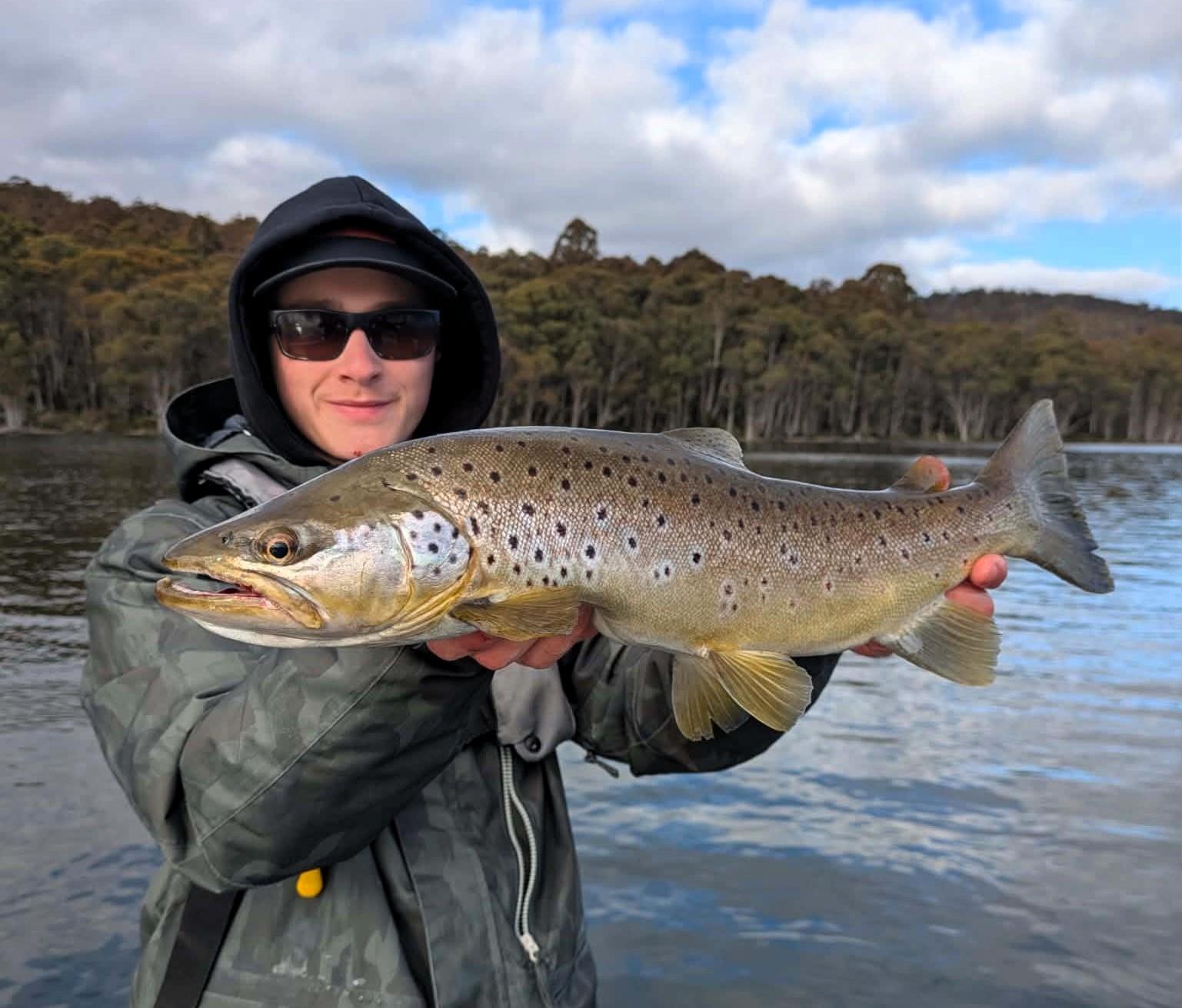 Arthur Whittock with a superb brown trout he caught from Bronte Lagoon over opening weekend