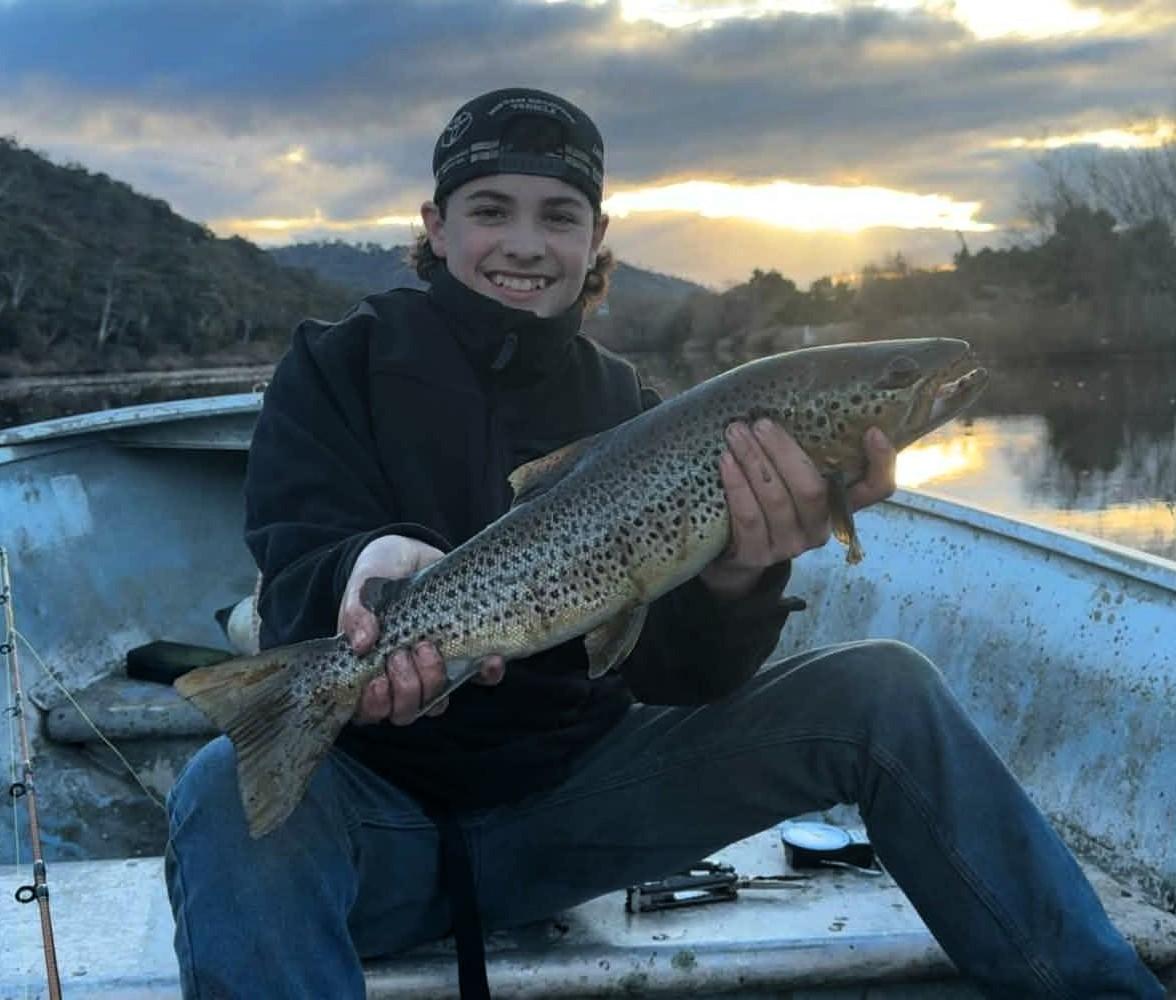 Mitchell Kaititis with a solid brown trout caught recently in the Derwent River.