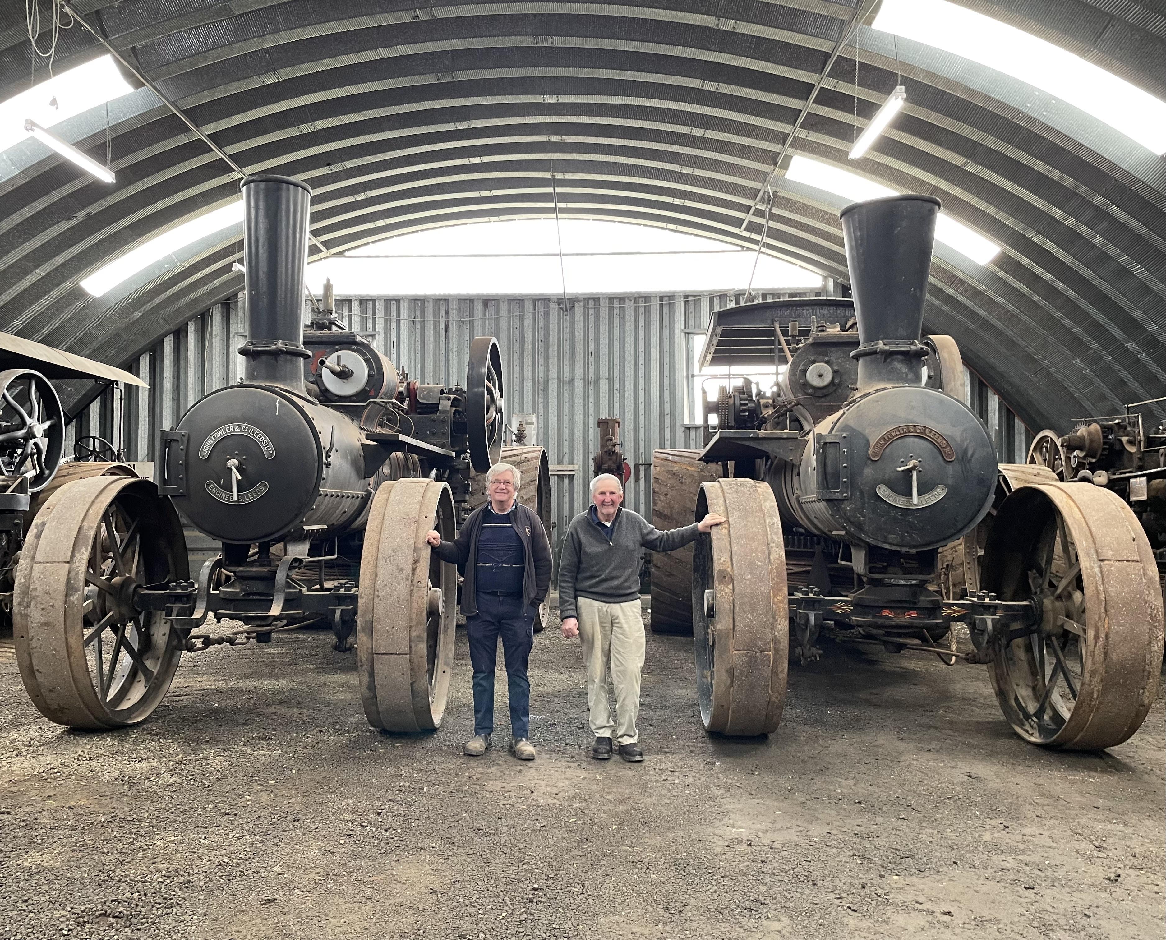 Westbury Preservation Association treasurer Robert Hill, left, and president Brenton Heazlewood with The Lion and The Lioness - a rare pair of Fowler winding engines which have returned to Tasmania this week after a 50-year absence.