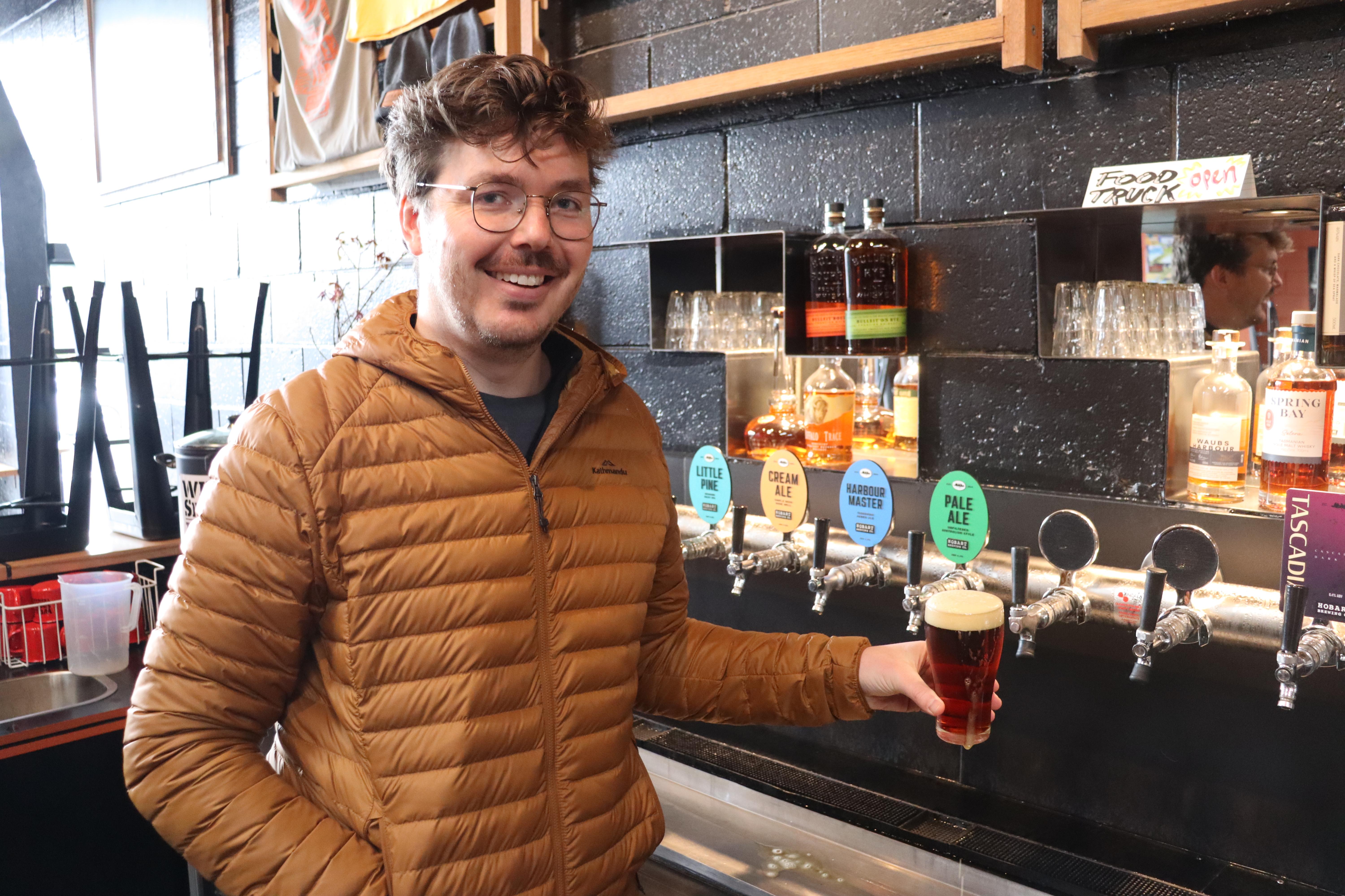 Nick Devereux with a beer.
