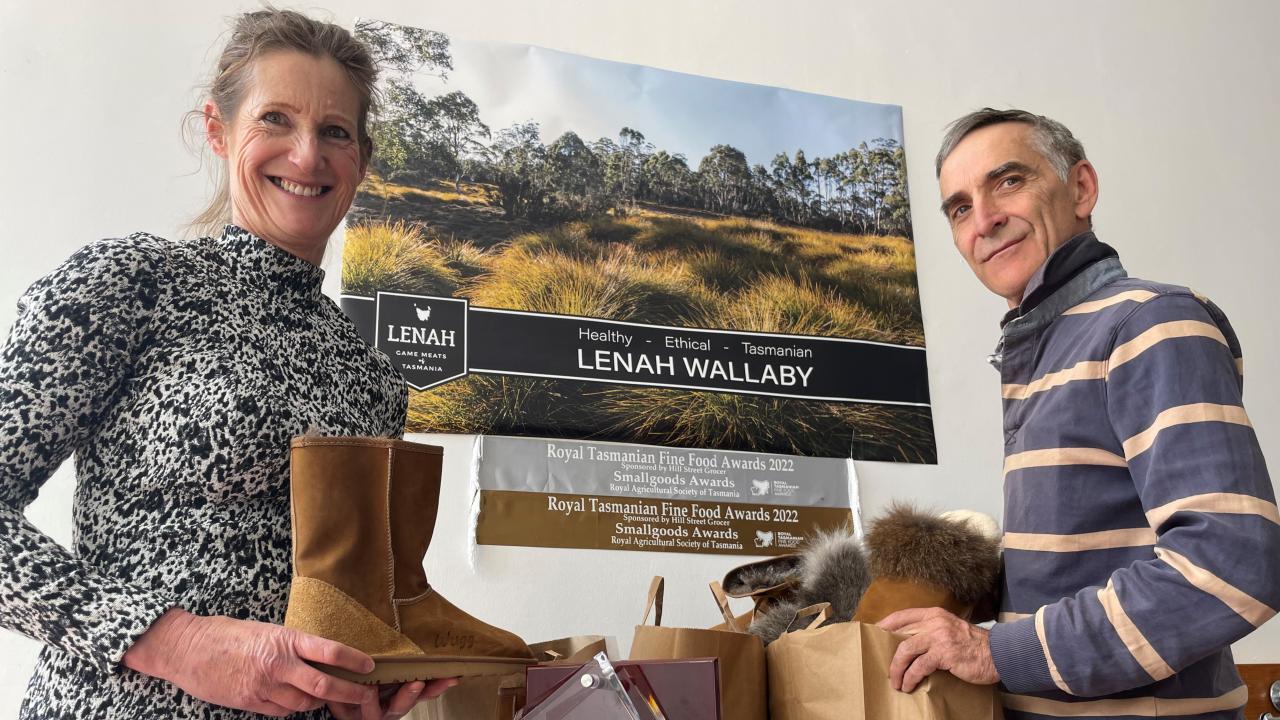 Katrina and John Kelly boxing up wallaby fur footwear, Wuggs, for sale at the recent Deloraine Craft Fair. Katrina and John Kelly