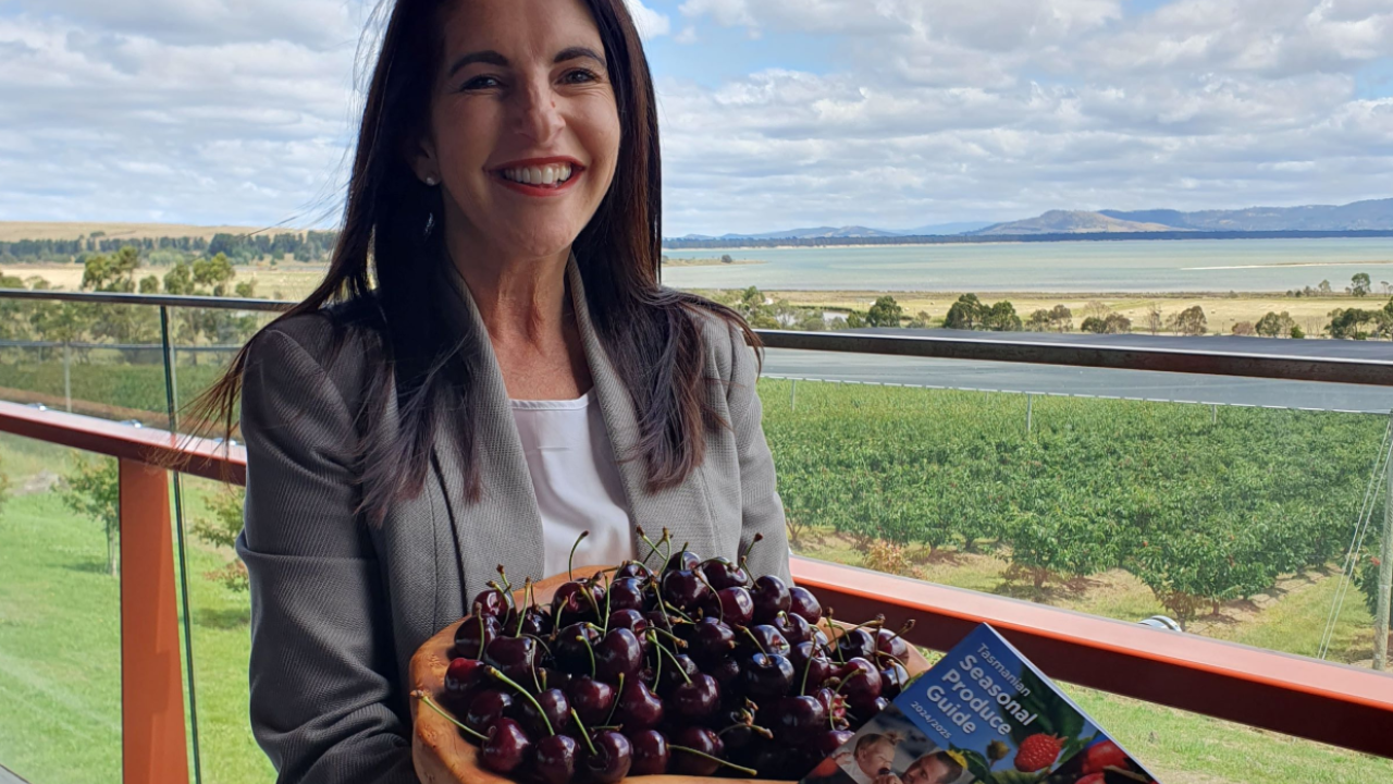 Primary Industries and Water Minister Jane Howlett with a box of cherries at the SPG launch Primary Industries Minister Jane Howlett with a box of cherries at the SPG launch