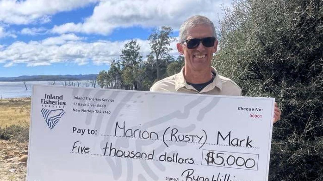 Marion "Rusty" Mark has won $5000 for catching a tagged trout. Marion "Rusty" Mark has won $5000 for catching a tagged trout.