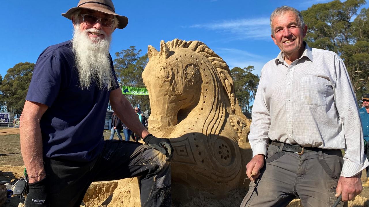 Jim McCauley and Peter Bignell with their steam punk horse sand sculpture. Jim and Peter
