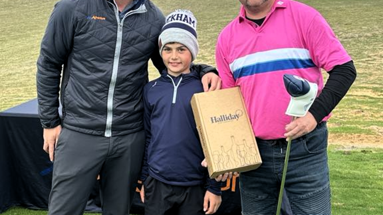 ir Adventures Golf general manager Jon Perrett, left, with young golf sensation Zac Wolfe and overall title winner Matt Cullen. ir Adventures Golf general manager Jon Perrett, left, with young golf sensation Zac Wolfe and overall title winner Matt Cullen.