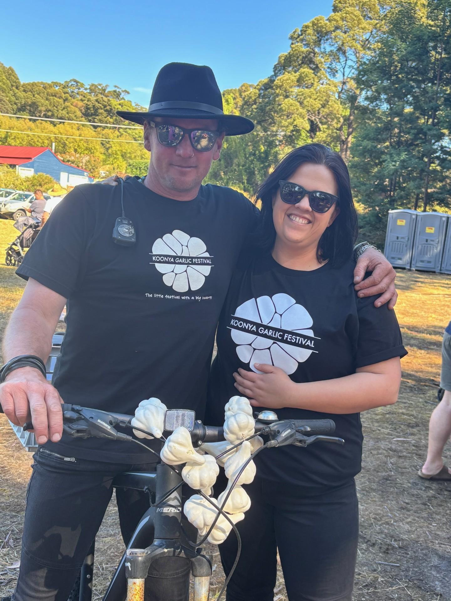 Edan Manley of Slopen Main and Rebecca Smith of Sorell volunteer at the Garlic Festival.
