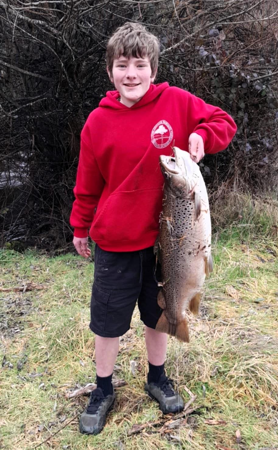Memphys Paynter with the 9.2 kg-20.2 lb female brown trout he caught on a soft plastic lure from the Tyenna River last weekend.
