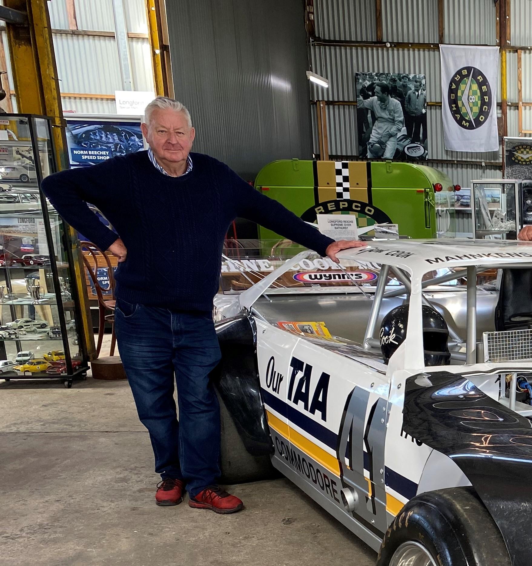 Rob Knott with some of his collection of motorsport memorabilia. 