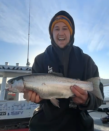 Jeremiah Perkins with a solid Rainbow Trout he landed at Toom's Lake last week.