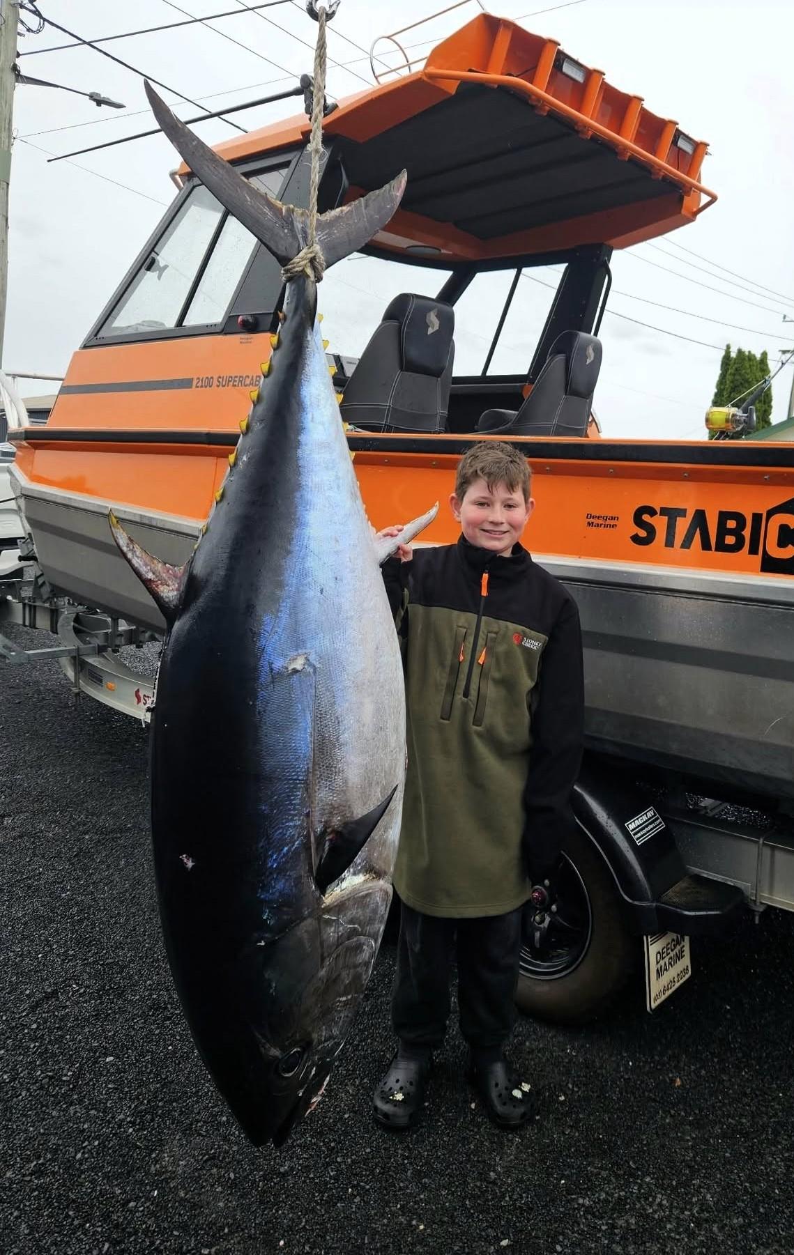 Harrison Nicole, 12, with the 130.5 kg Southern Bluefin Tuna he caught off Bass Strait.