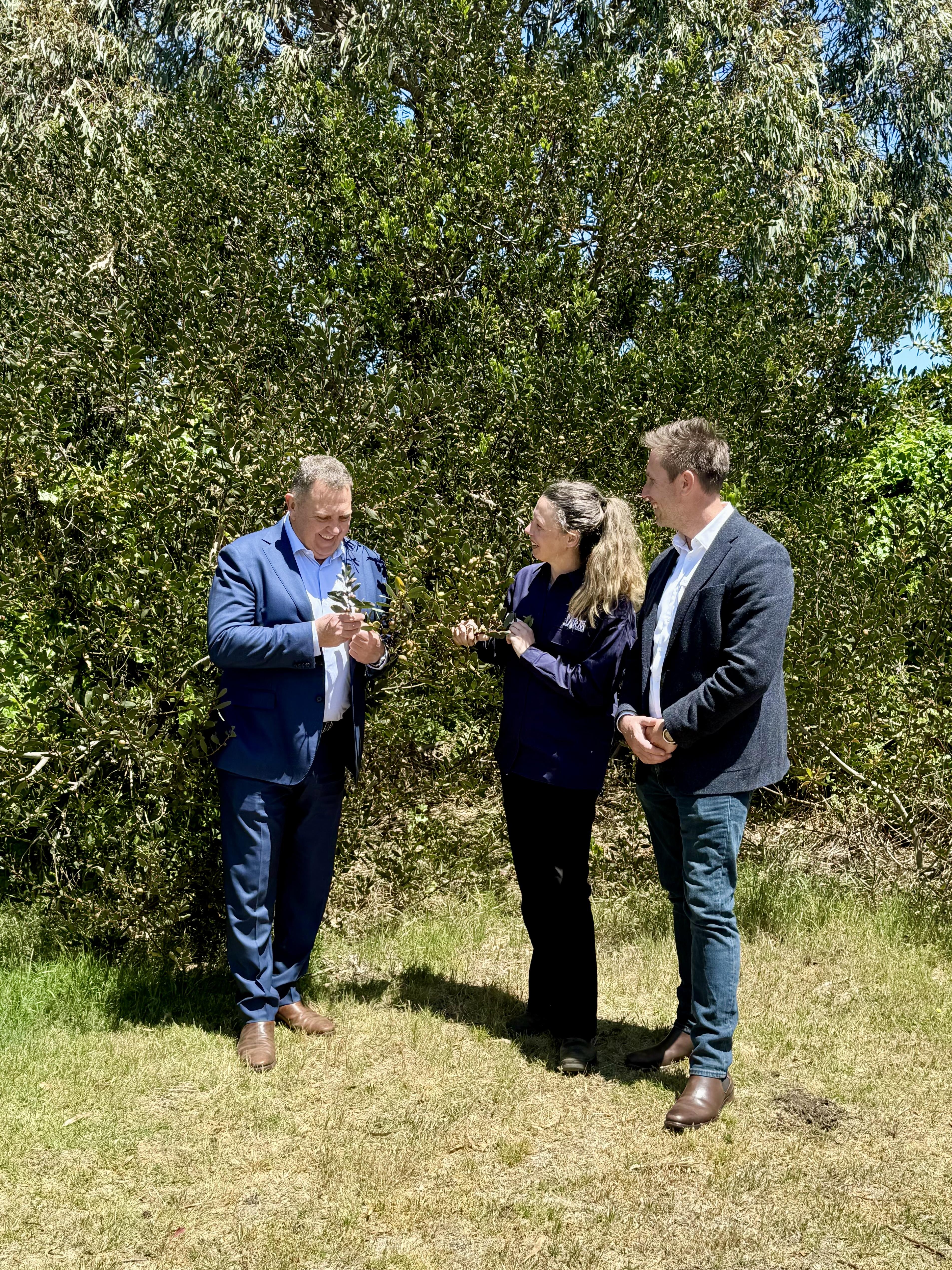 Minister for Primary Industries and Water, the Hon Gavin Pearce MP, with CCNRM Regional Weeds Coordinator Petra Wilden and CEO Phil Reid