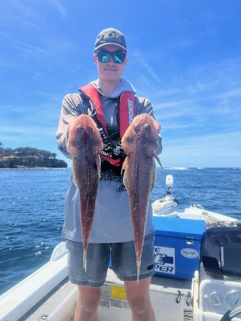 Ewan Dillon with two nice flathead he caught recently from Pirates Bay