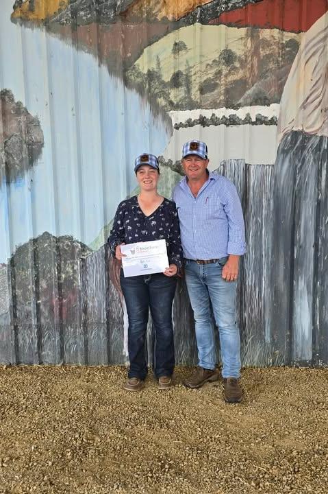 Winner of the 2026 Award at the Tasmanian Junior Beef Expo Sophie Smith with Tasmanian Shorthorns president Reg Woodiwiss.