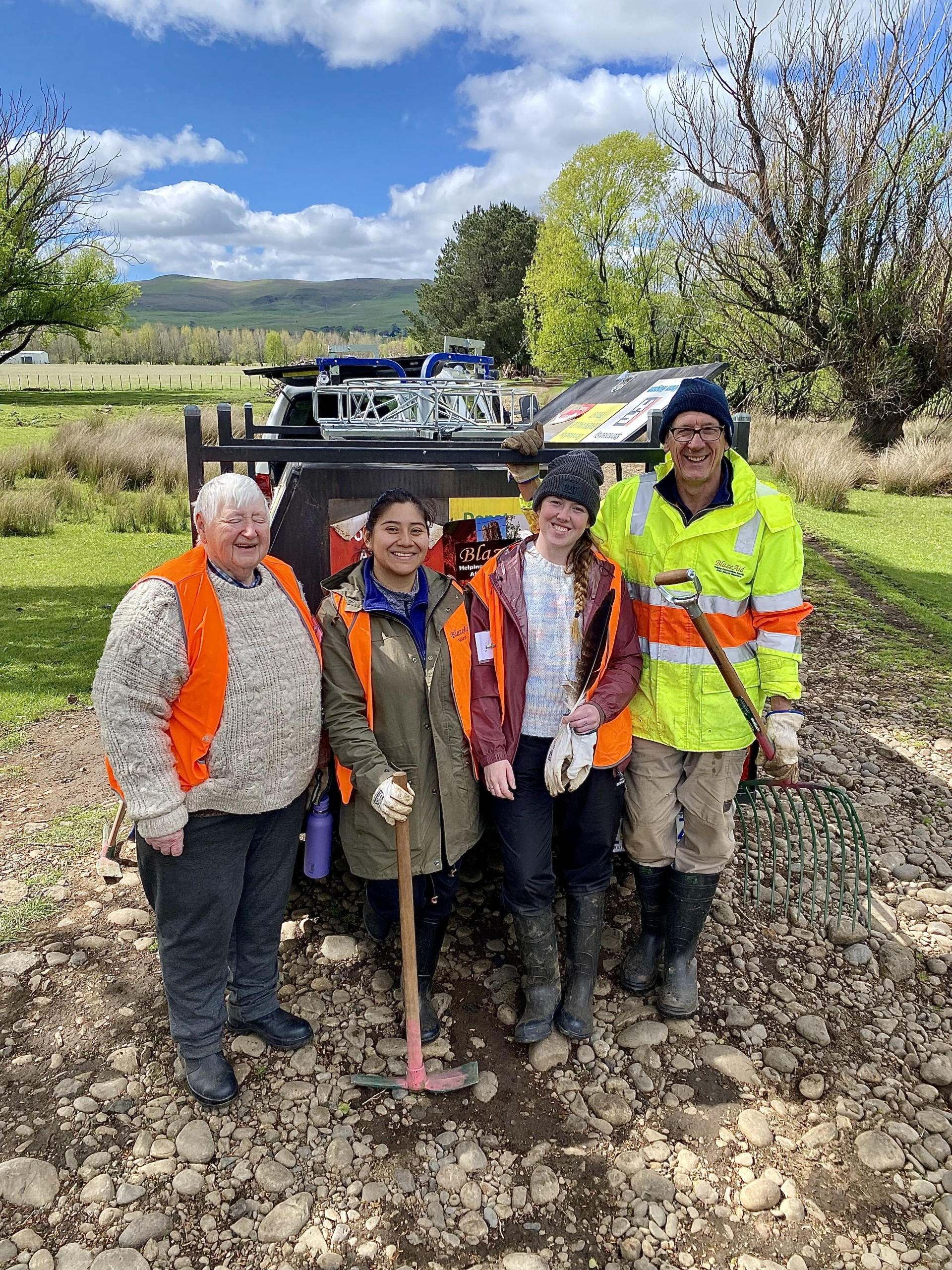 L-R Blaze Aid volunteers; Cheryl Youkee from Sheffield, Vanessa Alayo from Canada, Amy Curran from Ireland and Stewart Crafter from Melbourne on a property at Hamilton damaged by floods.