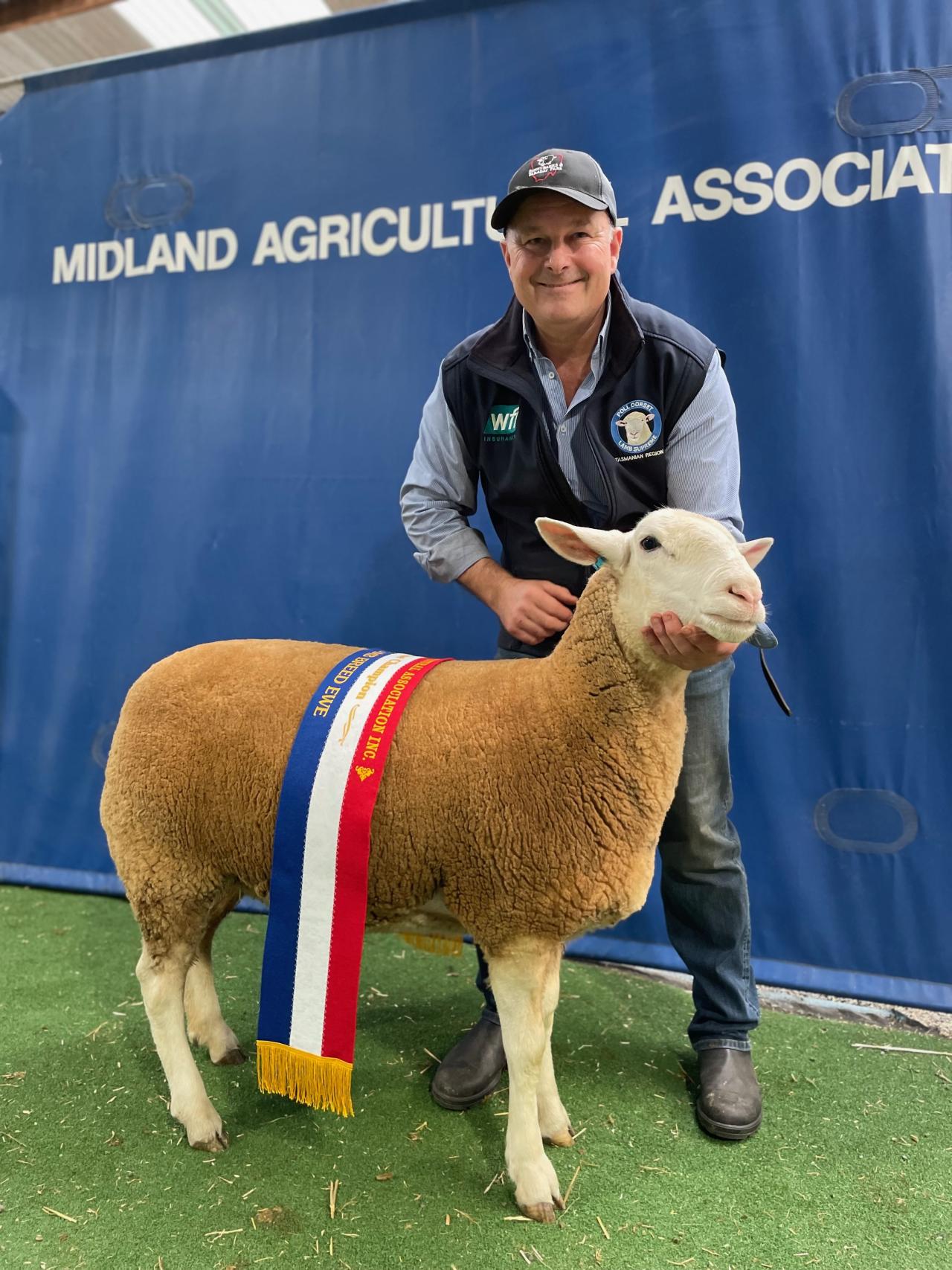 Paul Day with the Interbreed Ewe winner, a White Suffolk.